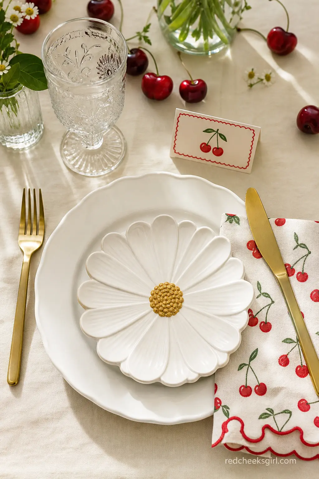 Cherry Motif Place Setting — Cherry-print napkins, or even just small cherry stickers on plain white napkins, can tie everything together without breaking the