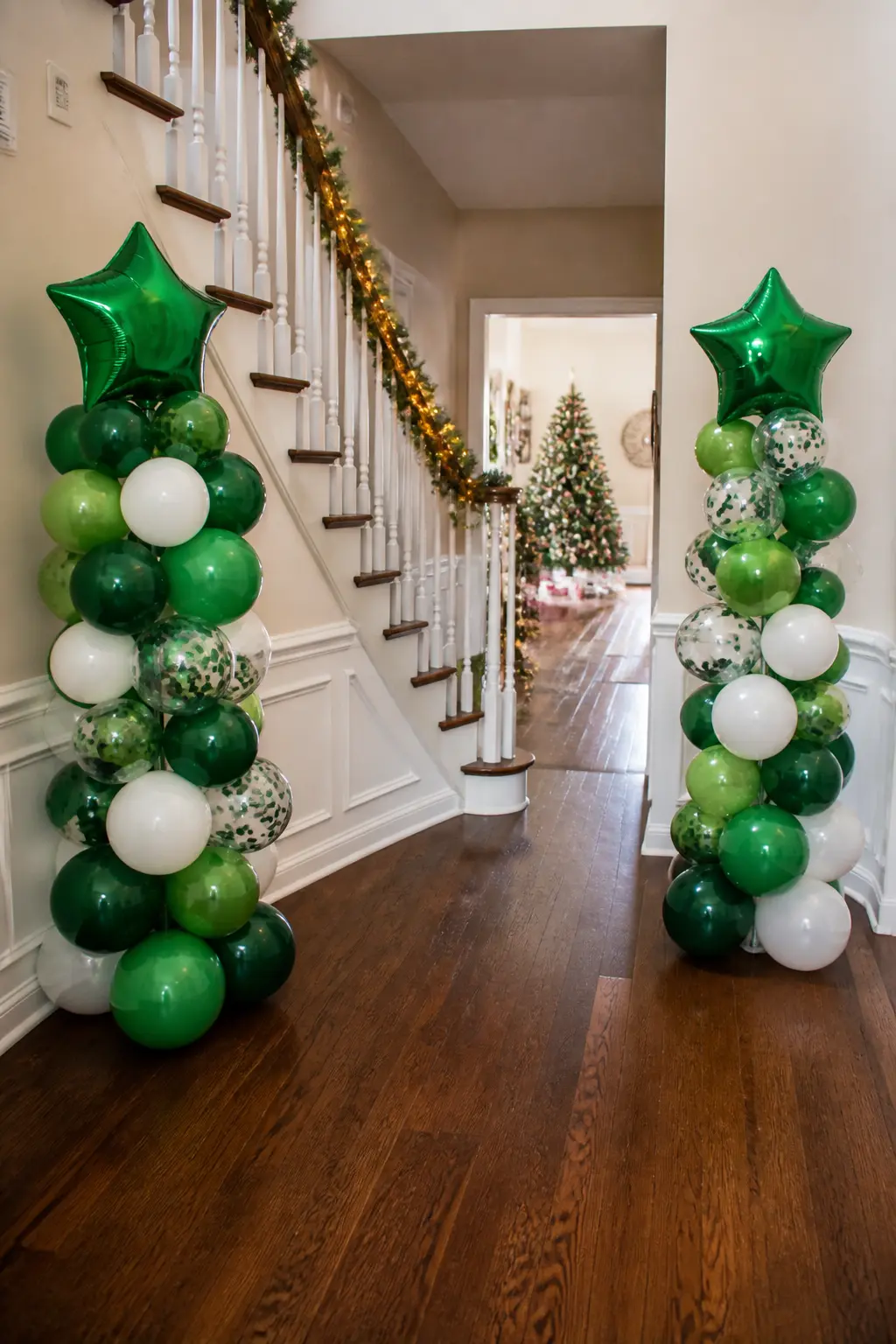 The Staircase Column Pair — Rather than a single arch, two matching balloon columns flank the bottom of a staircase: one on the newel post side, one against