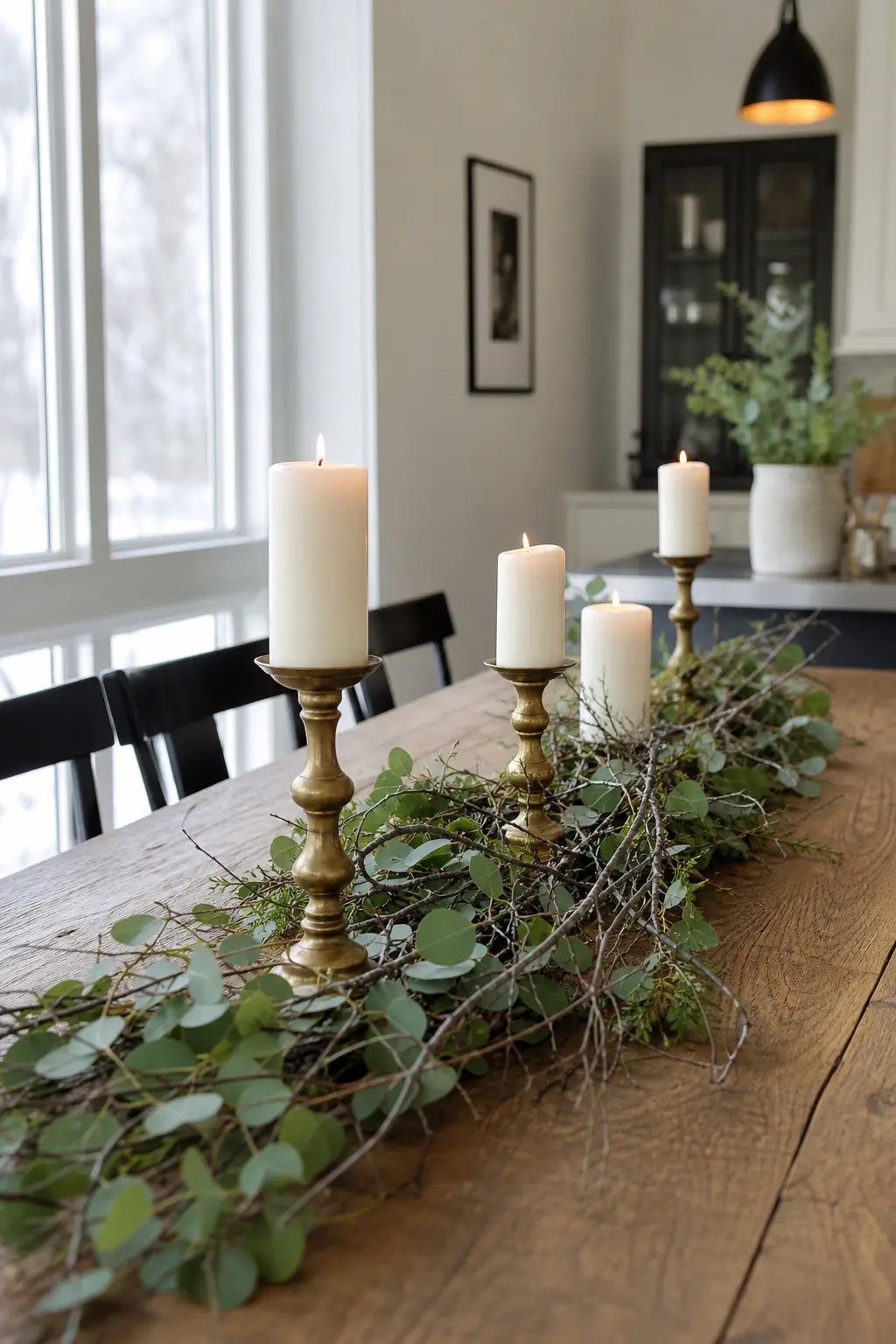 Candles Among the Table Greenery