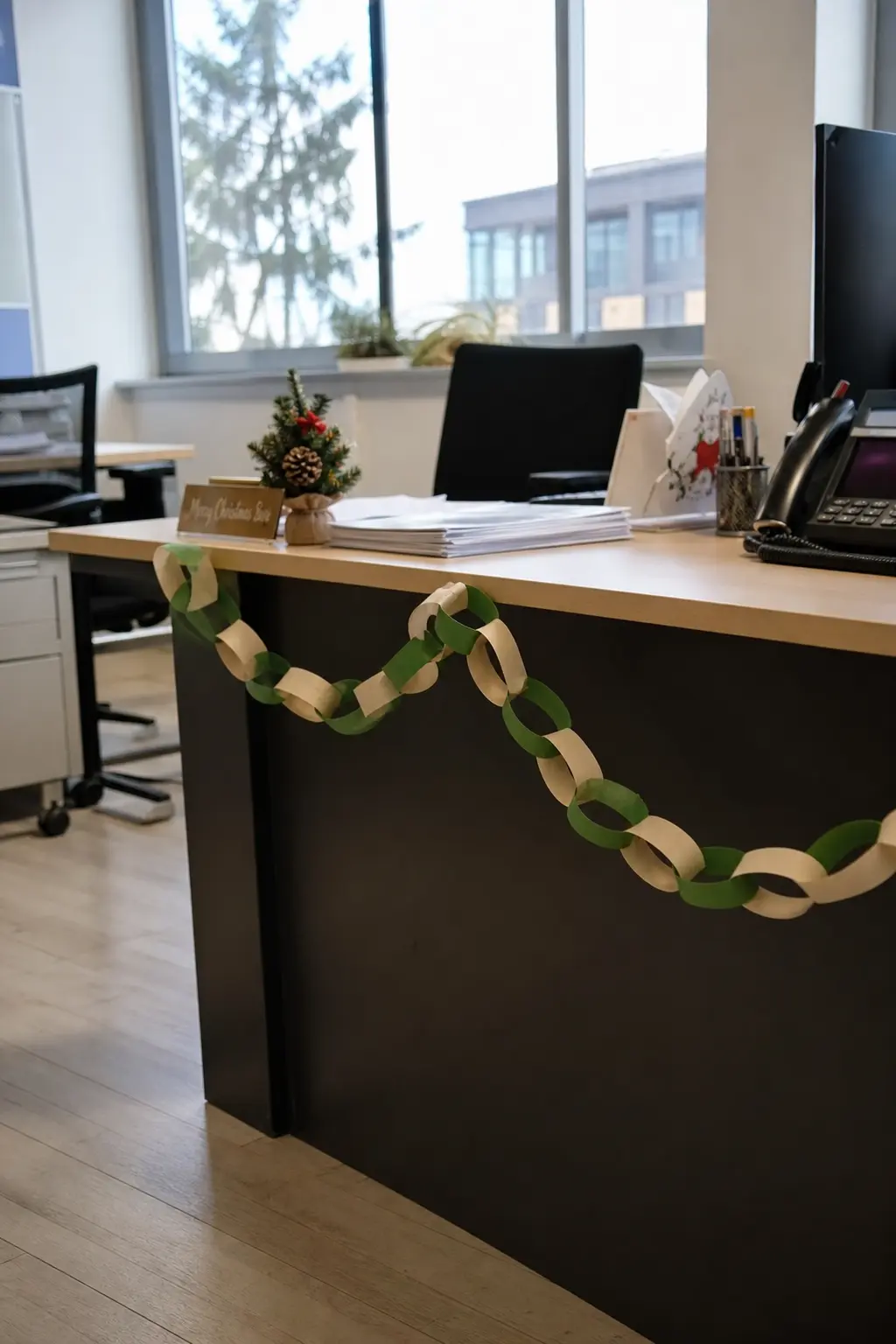 A Paper Chain Along the Desk Edge