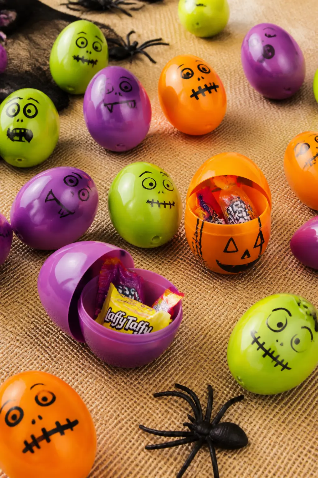Halloween Egg Hunt — Fill plastic Easter eggs in orange, green and purple with mini candy bars, small rubber spiders or folded dare slips. Diy halloween games