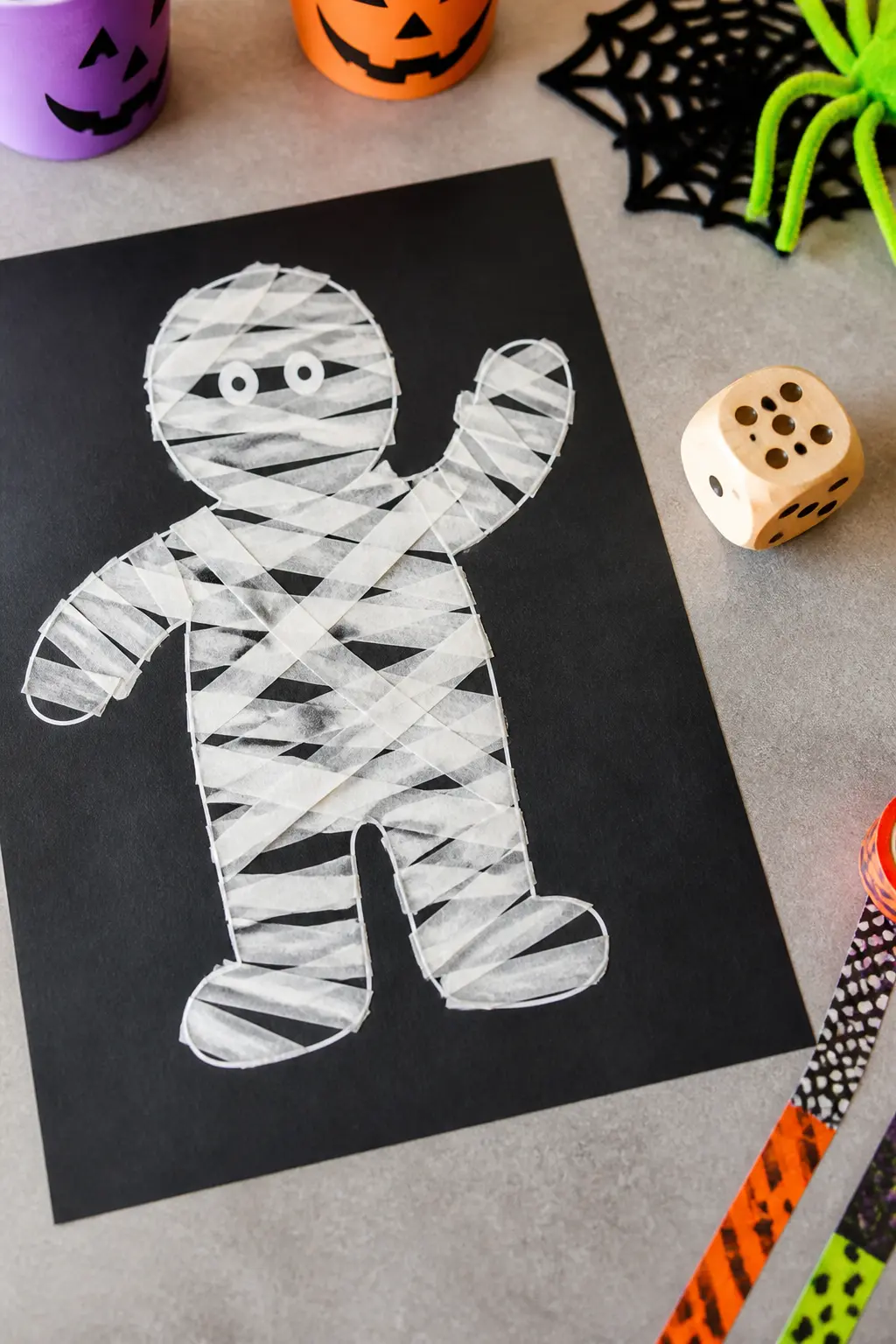 Mummy Dice — Each player starts with a paper mummy outline in front of them. Diy halloween games for kids
