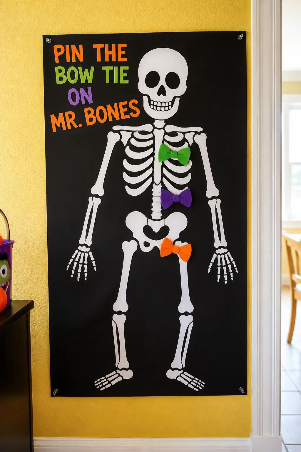 Pin the Bow Tie on Mr. Bones — Draw or print a large skeleton outline on black card stock and mount it on the wall at kid height. Diy halloween games for kids