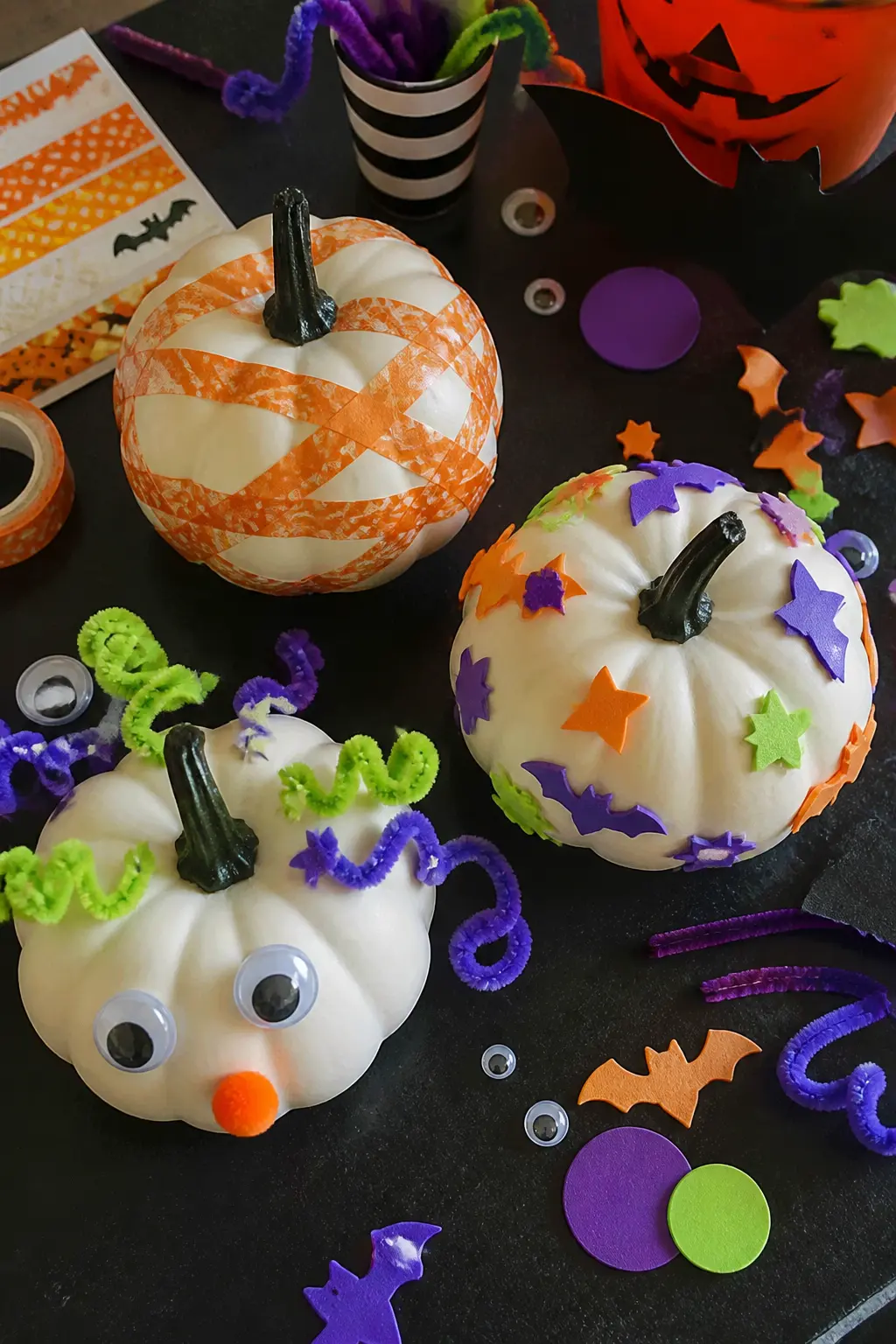 Pumpkin Decorating Timed Challenge — Give every child one small white plastic pumpkin and a tray of supplies: foam stickers, washi tape strips, pipe cleaners