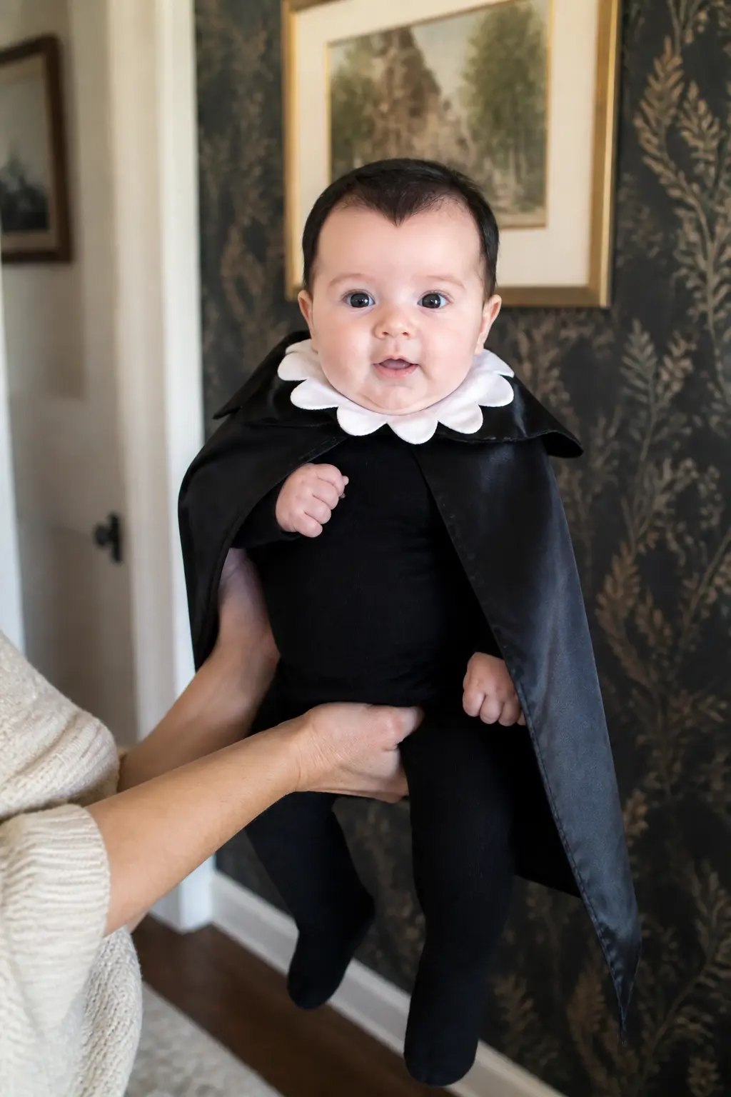 Baby Vampire — Dress the baby in a black onesie and snap a short black satin cape around the shoulders. Diy newborn halloween costumes