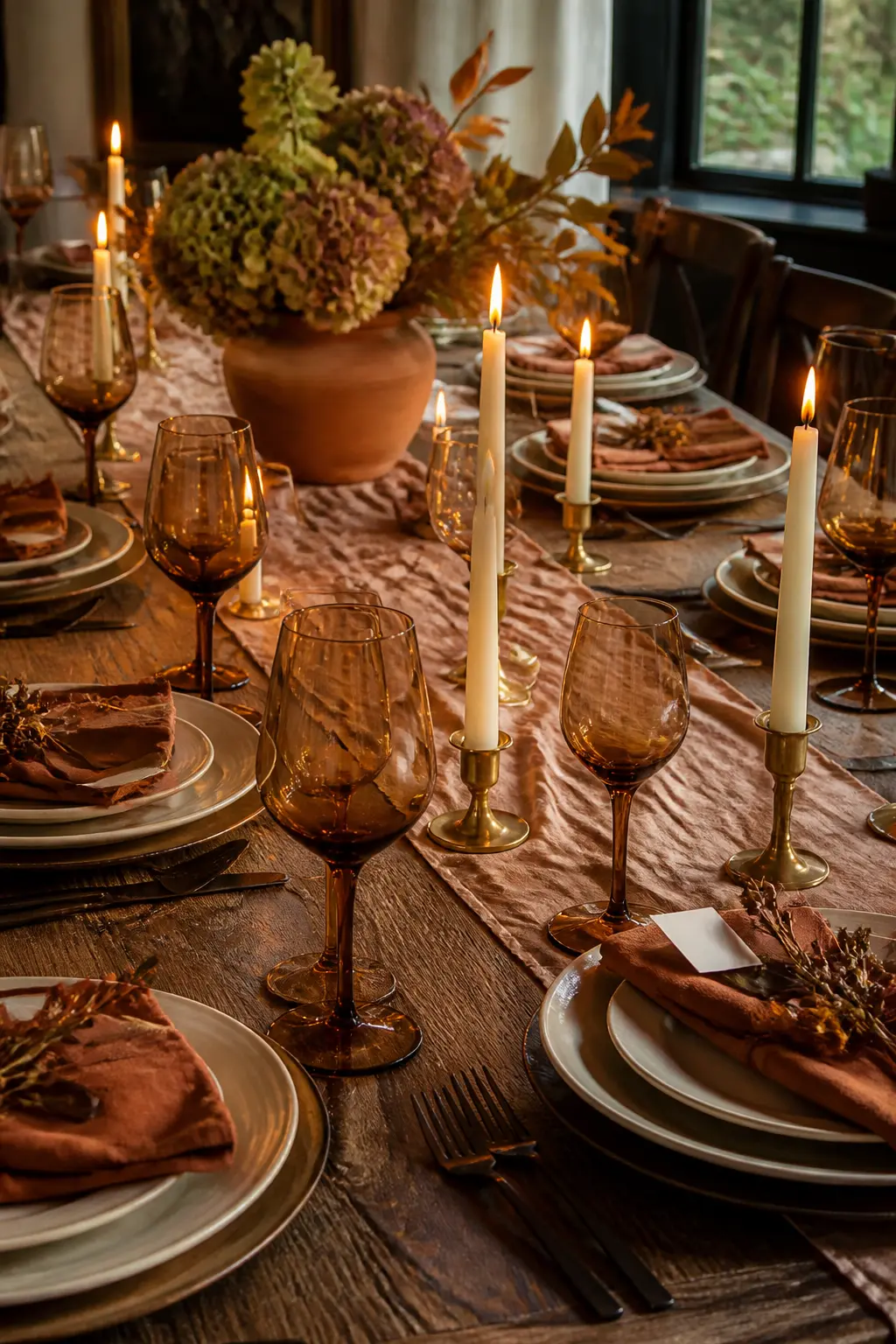 Smoked Glassware and Brass Candles on the Table