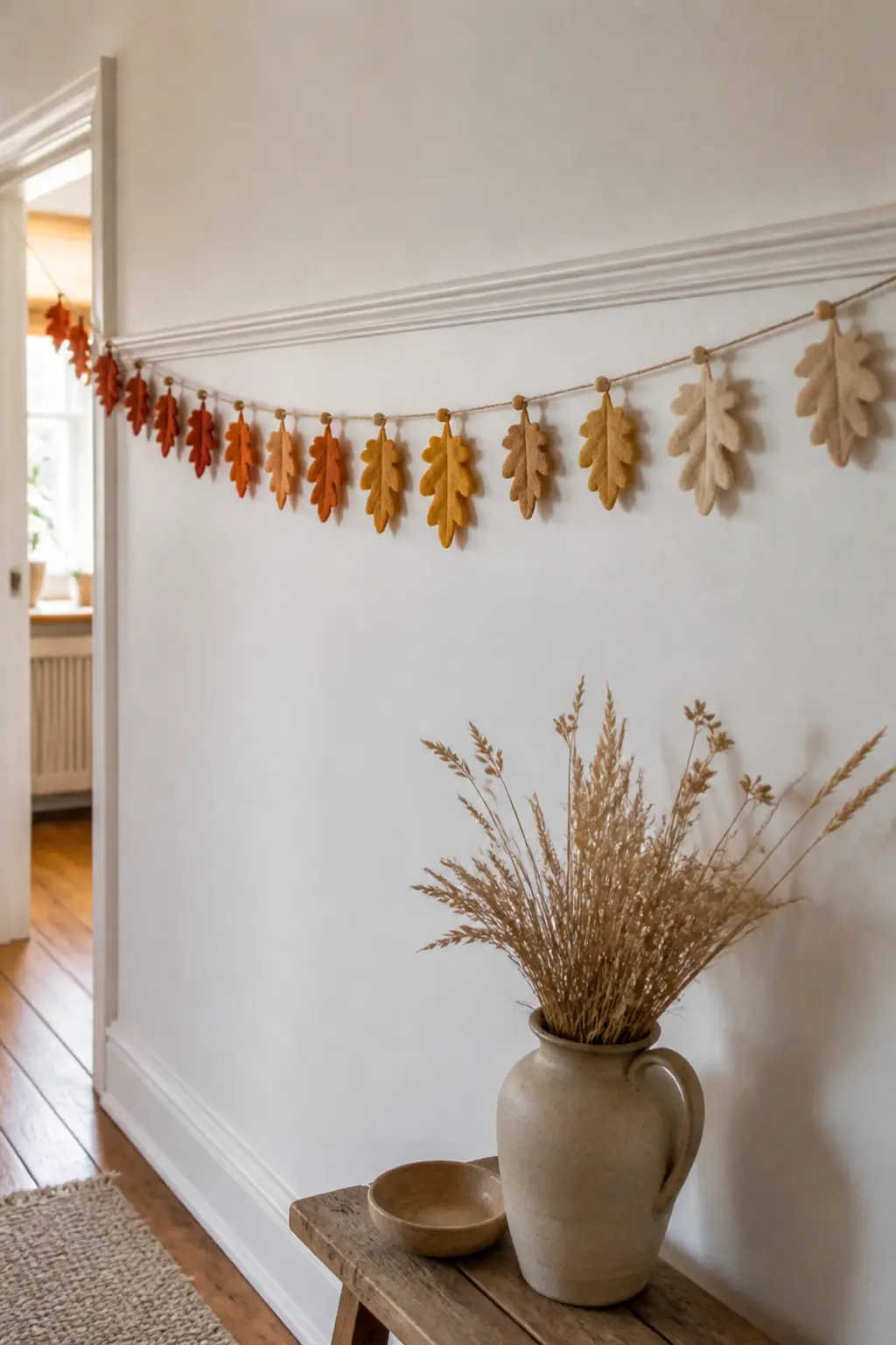 Gradient Ombre Leaf Run — Start one end of the strand with leaves in deep rust, transition through burnt orange and amber to warm sand at the other end. Fall