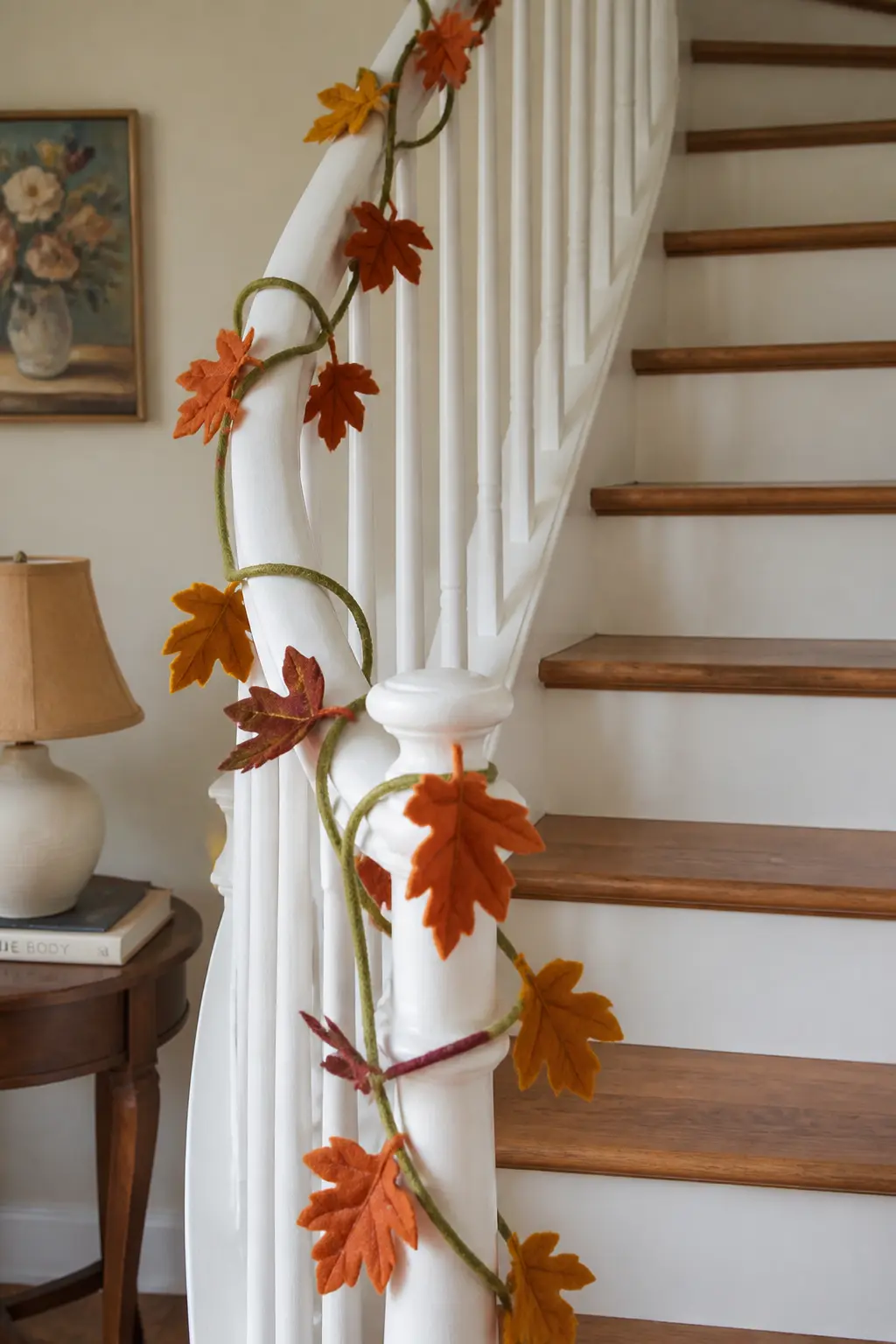 Winding Vine with Leaves on a Bannister — Cut a long continuous vine shape from deep olive felt, keeping it about half an inch wide with slightly irregular