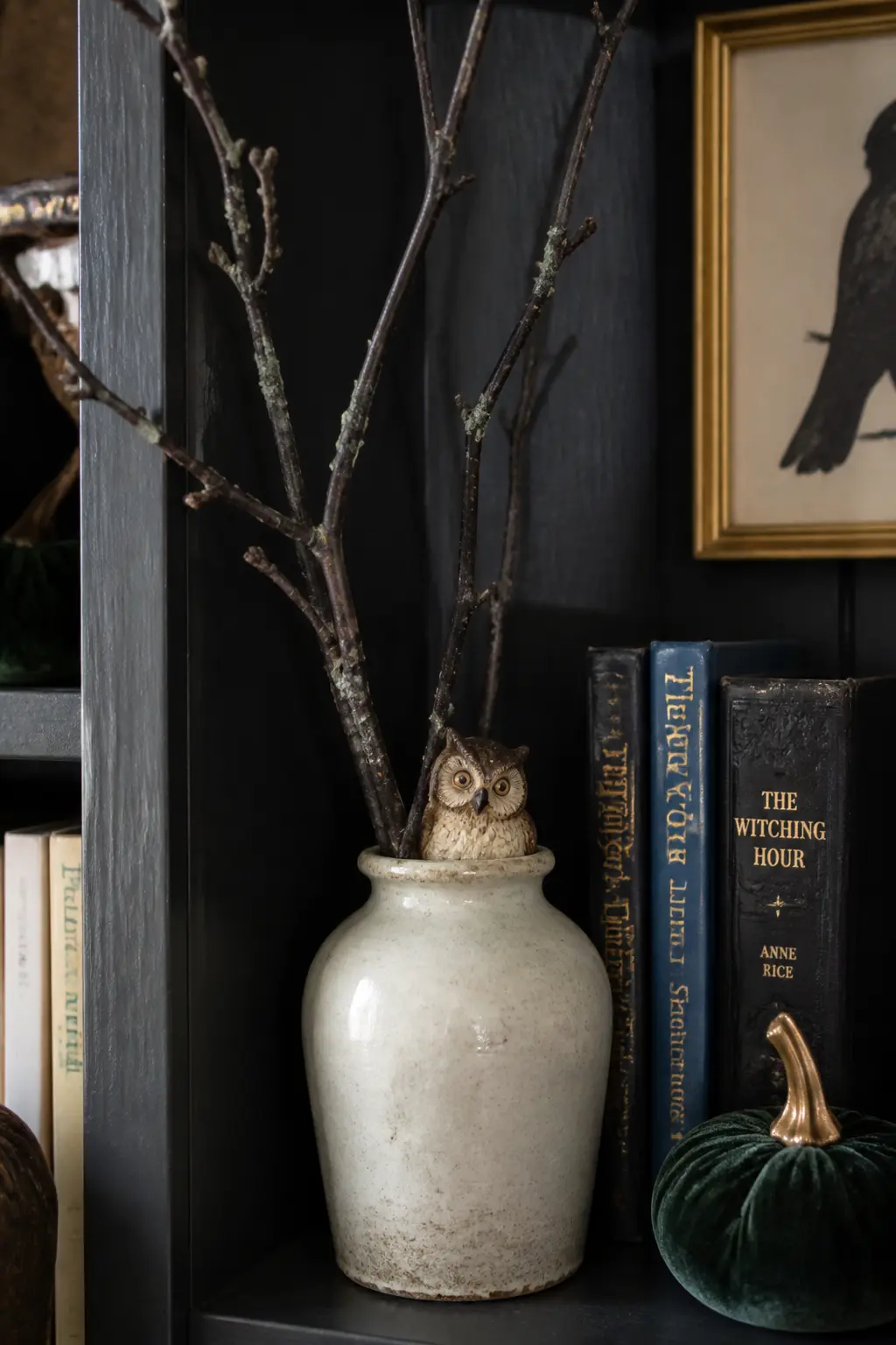 Tuck a Single Owl Figure into the Branch Vase