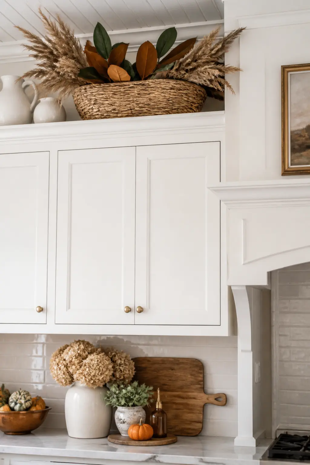 Woven Basket on Top of the Cabinets Holding Greenery