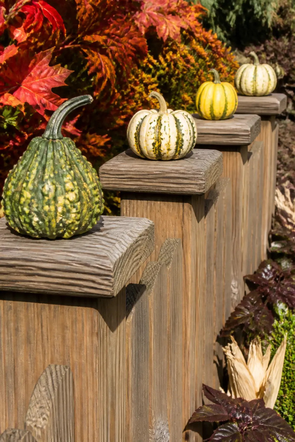 Fence Post Caps Topped with Small Gourds