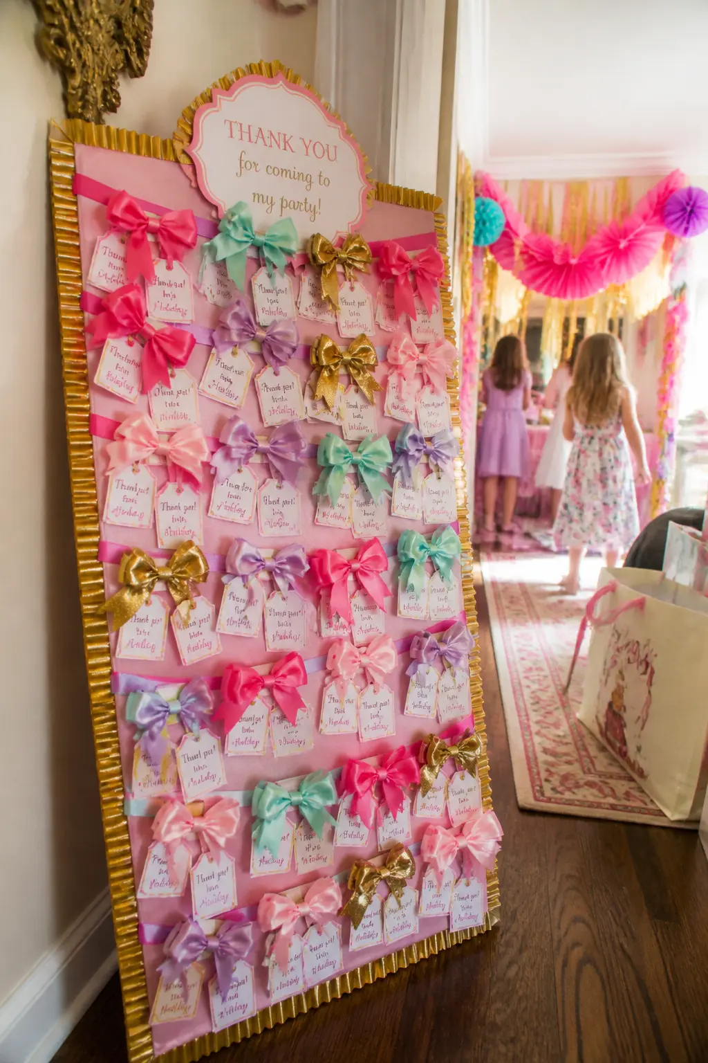 Personalised Silk Bow Clip Favour — A double-loop silk bow clip in the guest's choice of colour (offered on a small display board at the exit) is a favour that