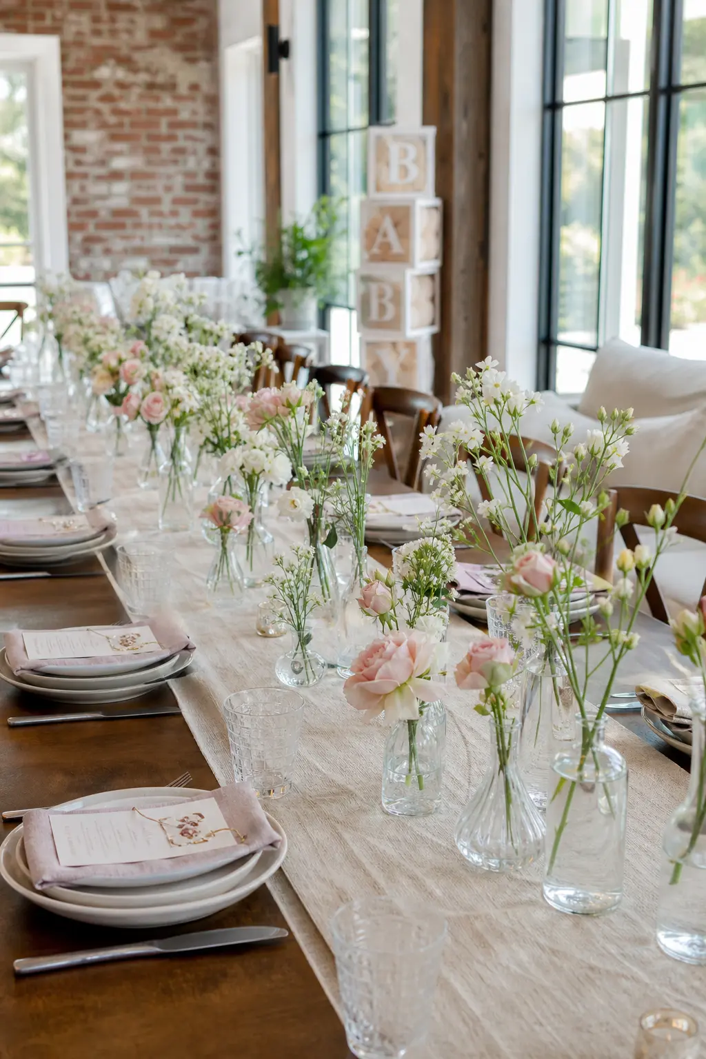 Florals in Bud Vases Repeated Down the Length of the Table