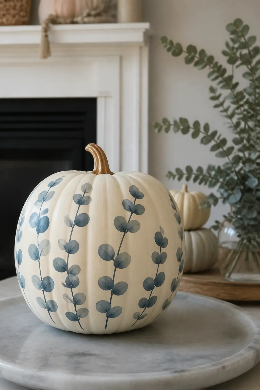 Eucalyptus Leaves in Pairs Along a Stem — Eucalyptus is the decorator's favourite foliage for a reason: paired oval leaves on a curving stem are both easy to