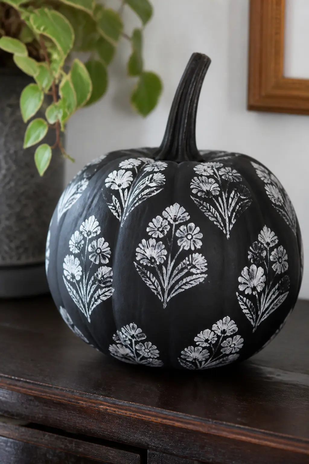 A Rubber Stamp Pressed in Repeat — A large foam or rubber floral stamp gives a block-printed look that reads as intentional pattern-making rather than