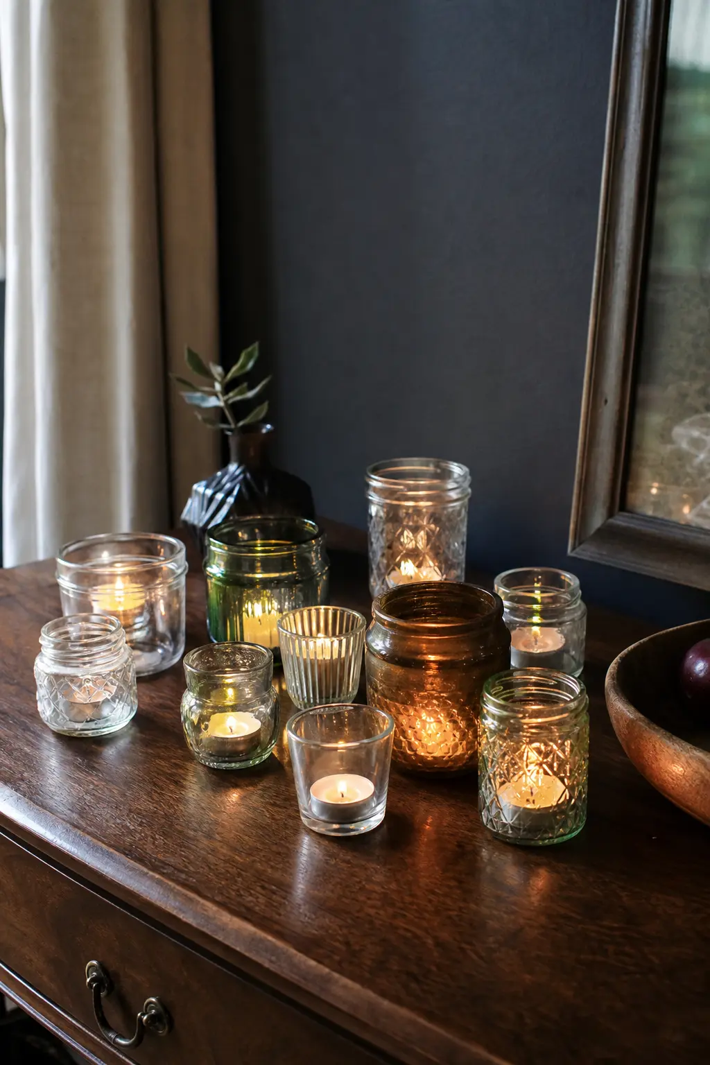 Candles in Mismatched Glasses