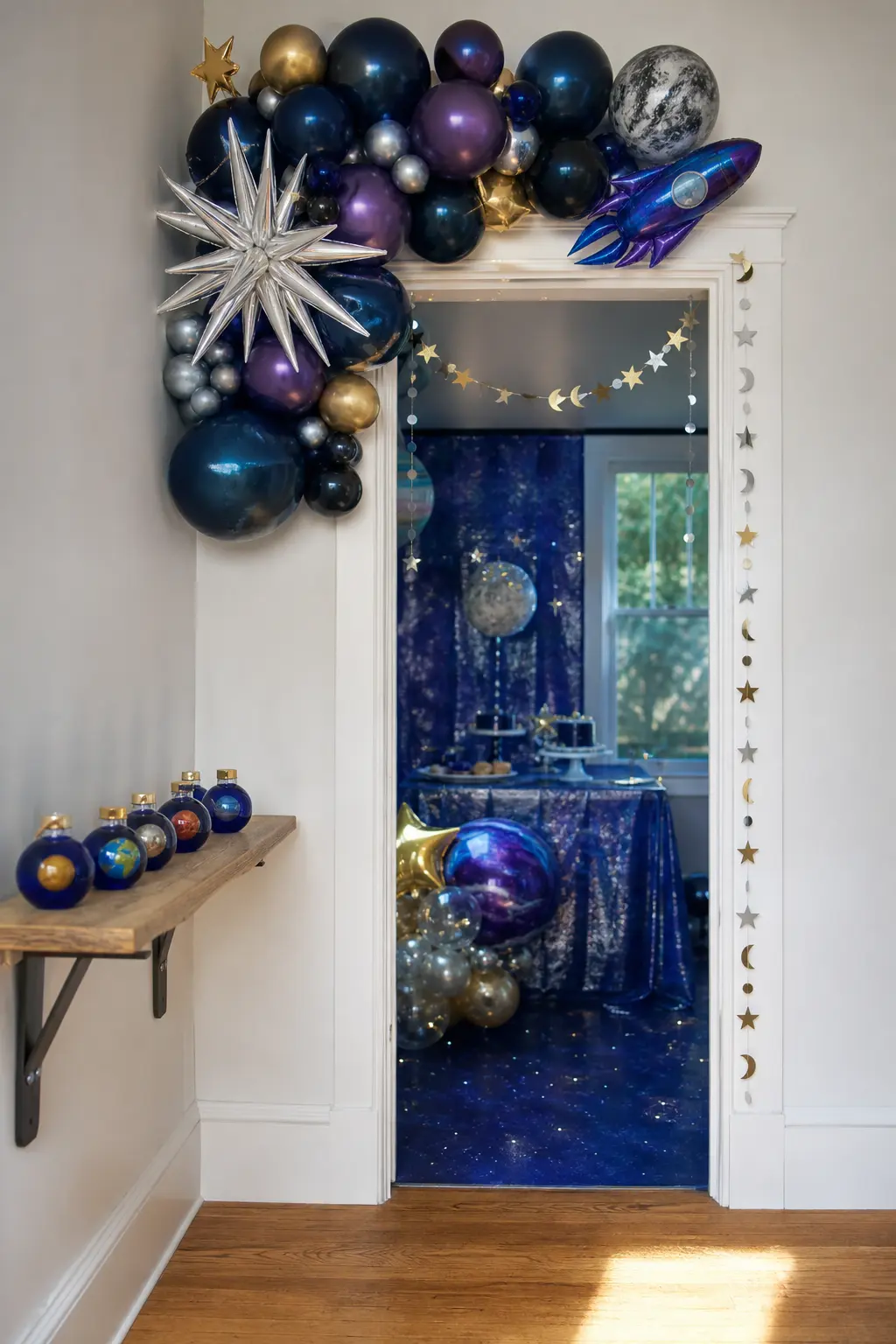 Personalized Planet Snow Globe — A small cobalt glass globe with a gold cap, holding a single tiny painted planet inside instead of a scene, gives every guest