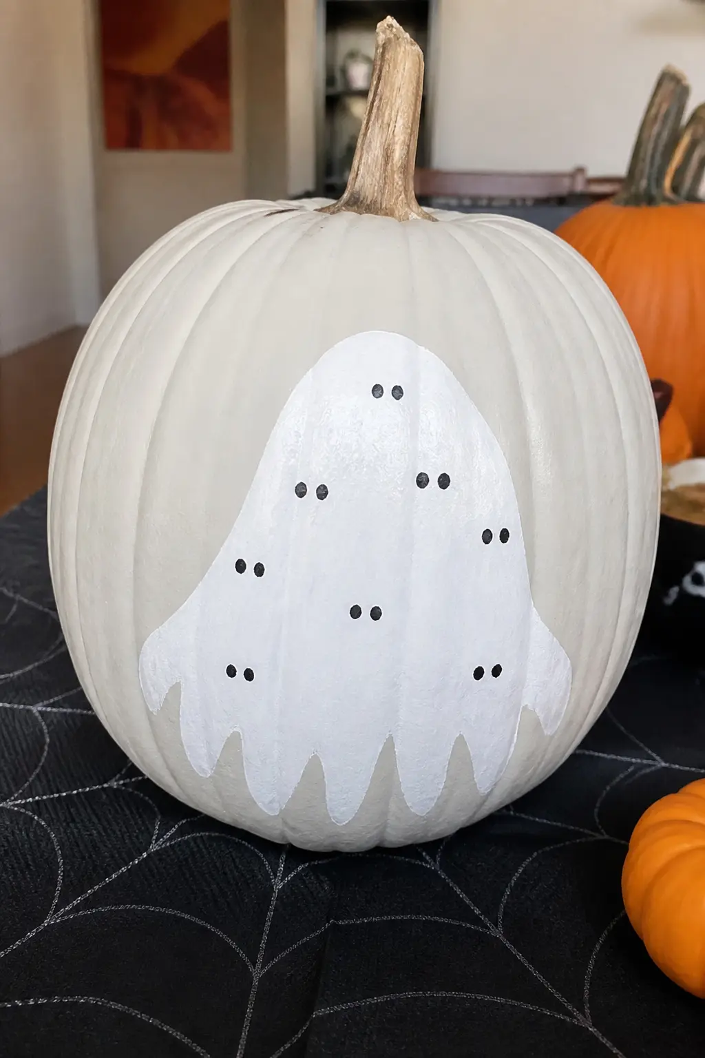 Ghost With Too Many Eyes — The ghost has a regular pair of eyes in the expected place, and then additional pairs scattered irregularly across its body: smaller