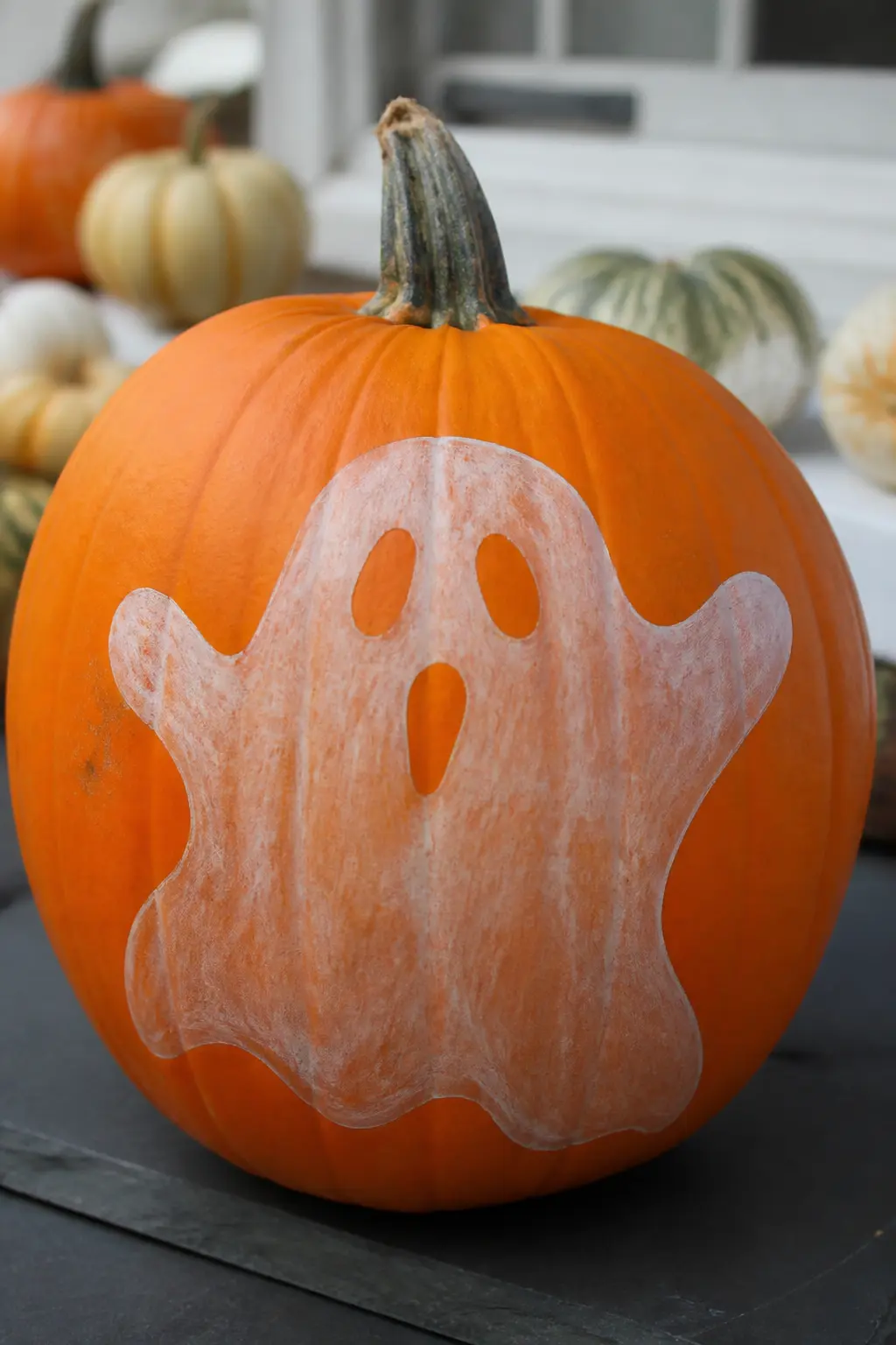 Translucent Ghost With the Base Showing Through — White paint diluted heavily with acrylic medium or water is washed over the ghost shape, leaving the