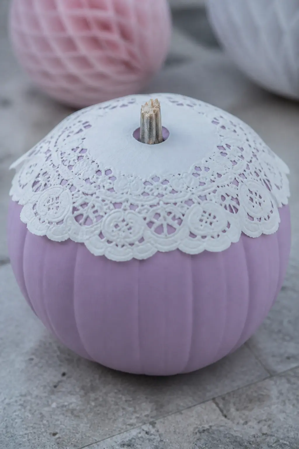 Lilac Pumpkin With a White Lace Doily Glued Flat on Top Like a Cap — Paint the pumpkin in lilac and let it cure fully. Girly painted pumpkin