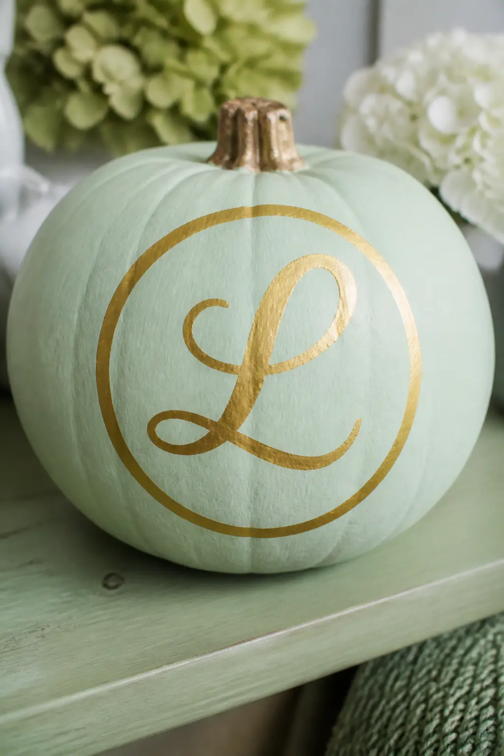 Mint Pumpkin With a Painted Gold Monogram Inside a Painted Circle — Paint the pumpkin in cool mint. Girly painted pumpkin