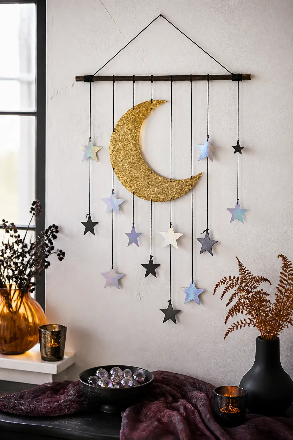 Glitter Moon and Stars Wall Hanging — Cut a large crescent moon from black card and a scatter of stars in three sizes. Glitter crafts