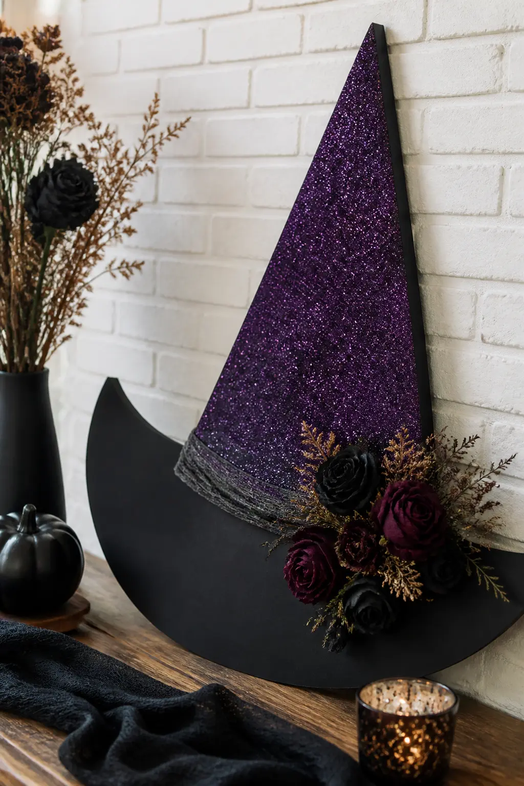Glitter Witch Hat Wall Art — Draw or trace a tall witch hat silhouette on black mountboard and cut it out. Glitter crafts