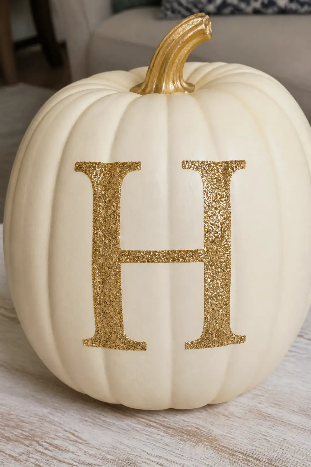 Cream Pumpkin With a Gold Glitter Monogram — Paint the pumpkin cream. Glitter pumpkin