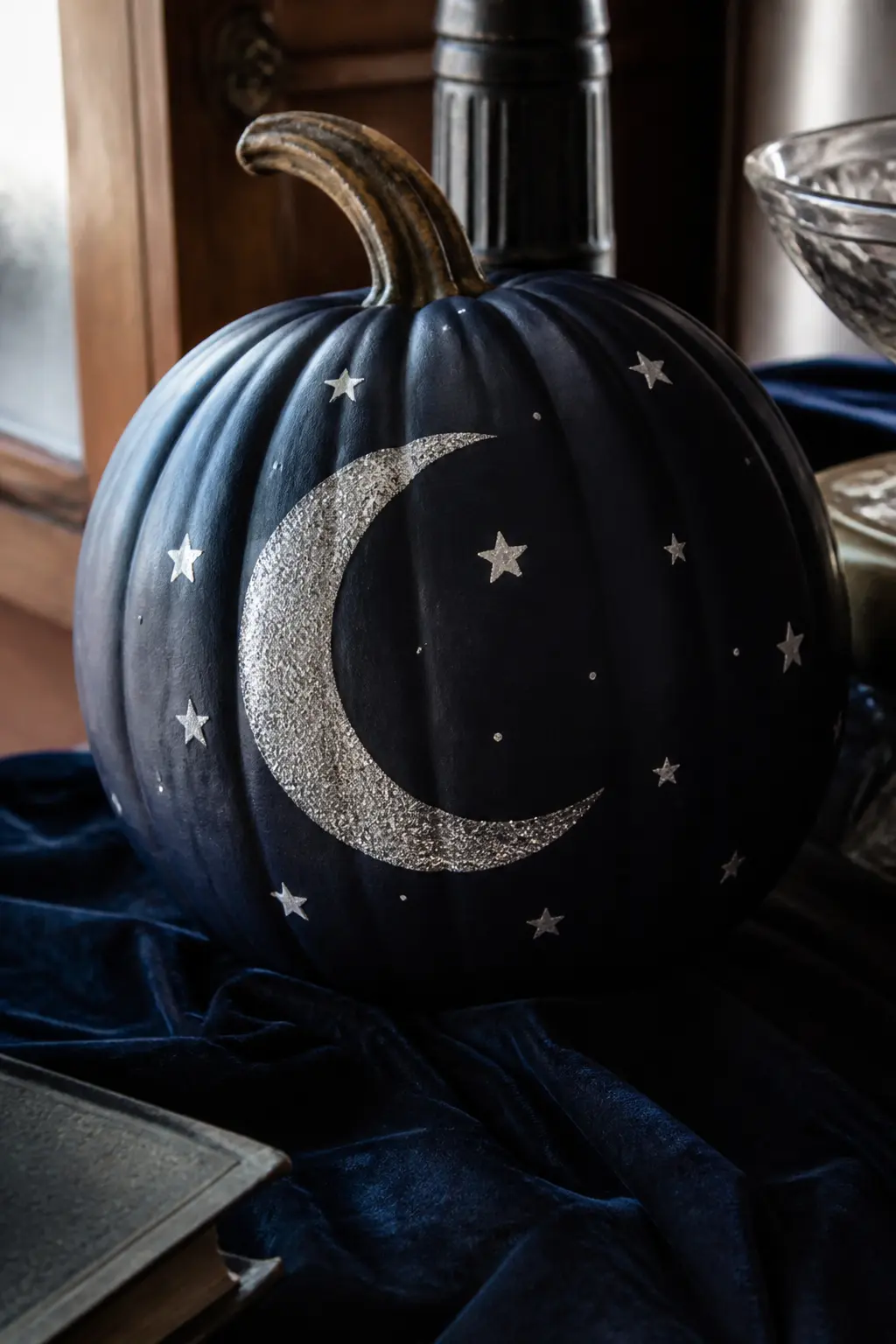 Navy Pumpkin With a Silver Glitter Crescent Moon and Matte Stars — Paint the pumpkin deep navy, two coats. Glitter pumpkin