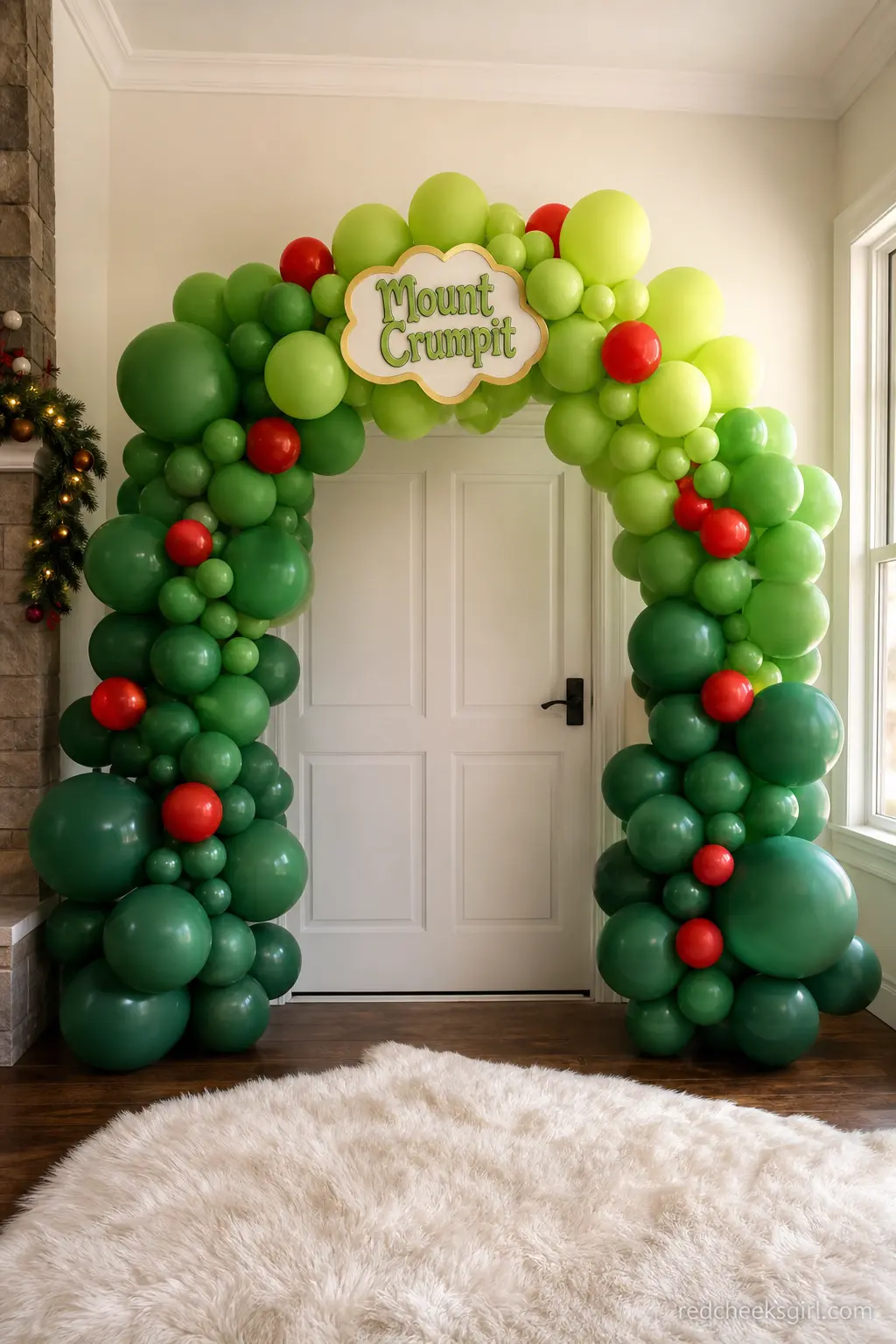 The Mount Crumpit Ombre Arch — An organic garland that shades from deep forest green at the base into pale lime near the top mimics a snowy hillside without a
