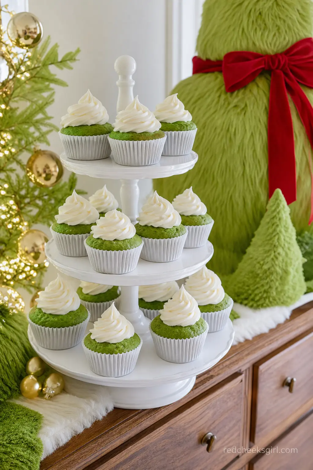 Snow-Capped Lime Muffins — A green velvet muffin batter, baked in plain white liners and topped with a swirl of cream cheese icing pulled to a peak, mimics a