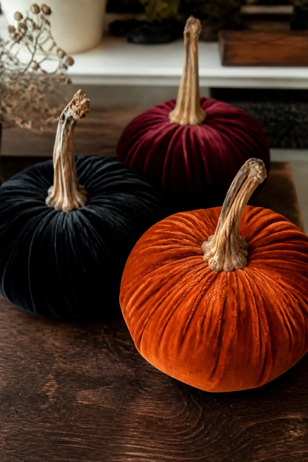 Velvet Pumpkin Cluster — Cut a circle of velvet, run a basting stitch around the outer edge, stuff the centre with polyfill, then pull the thread to gather the
