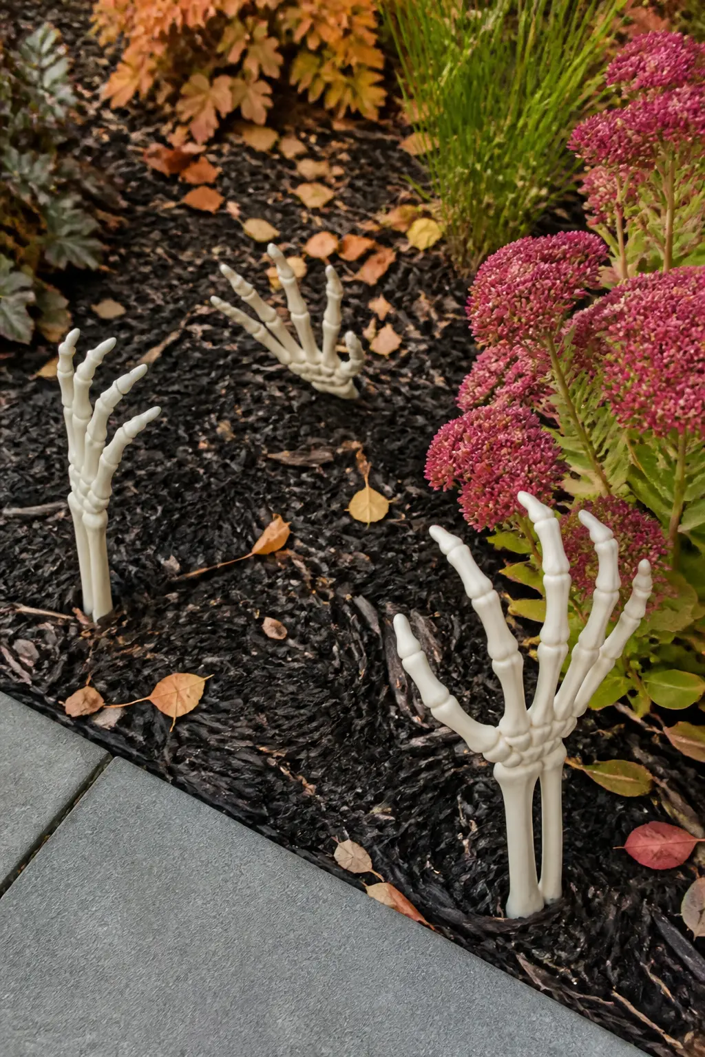 Zombie Hands Pushing Up Through the Mulch Beds