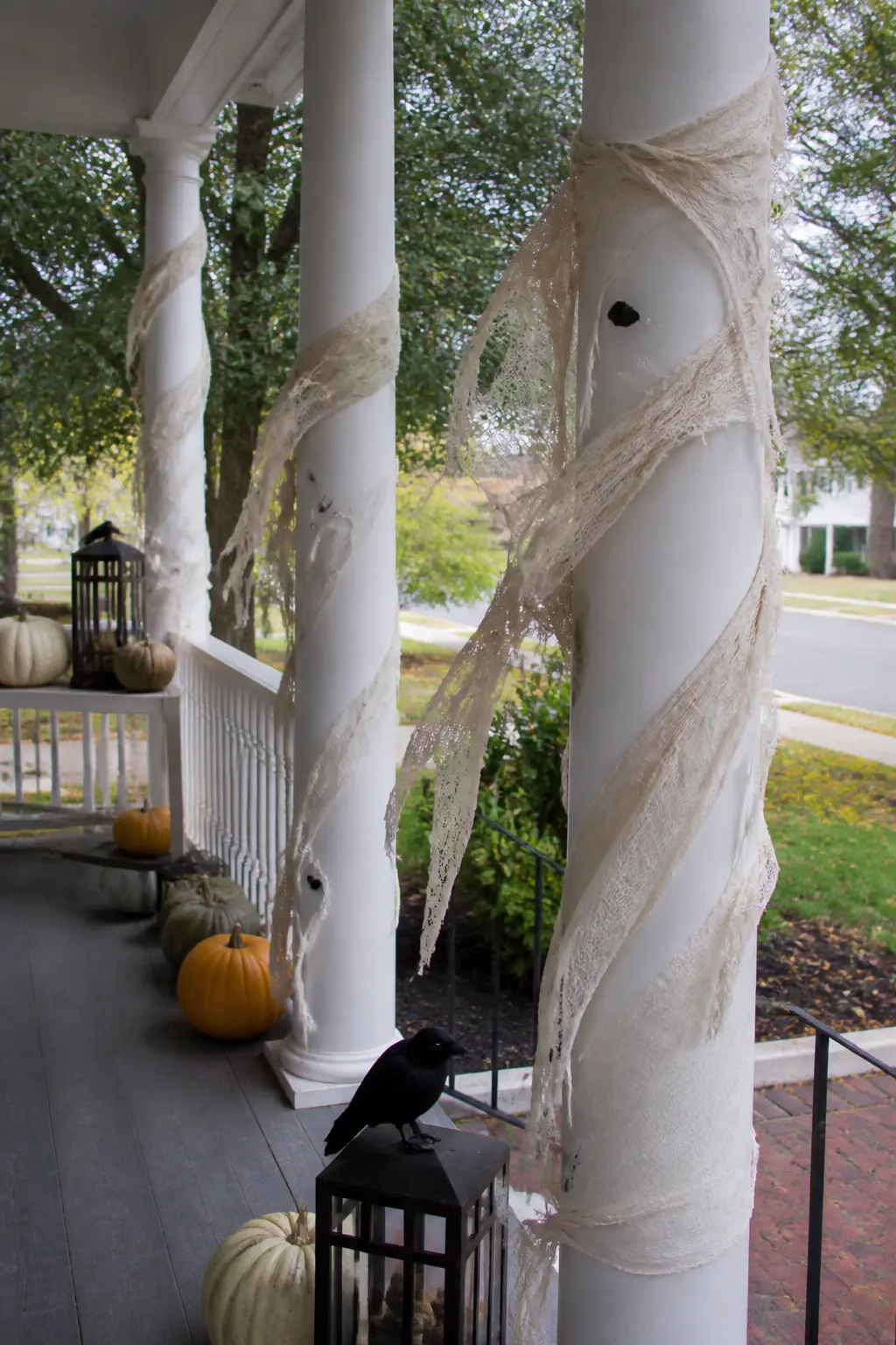 Torn Muslin Wrapped Around the Porch Columns