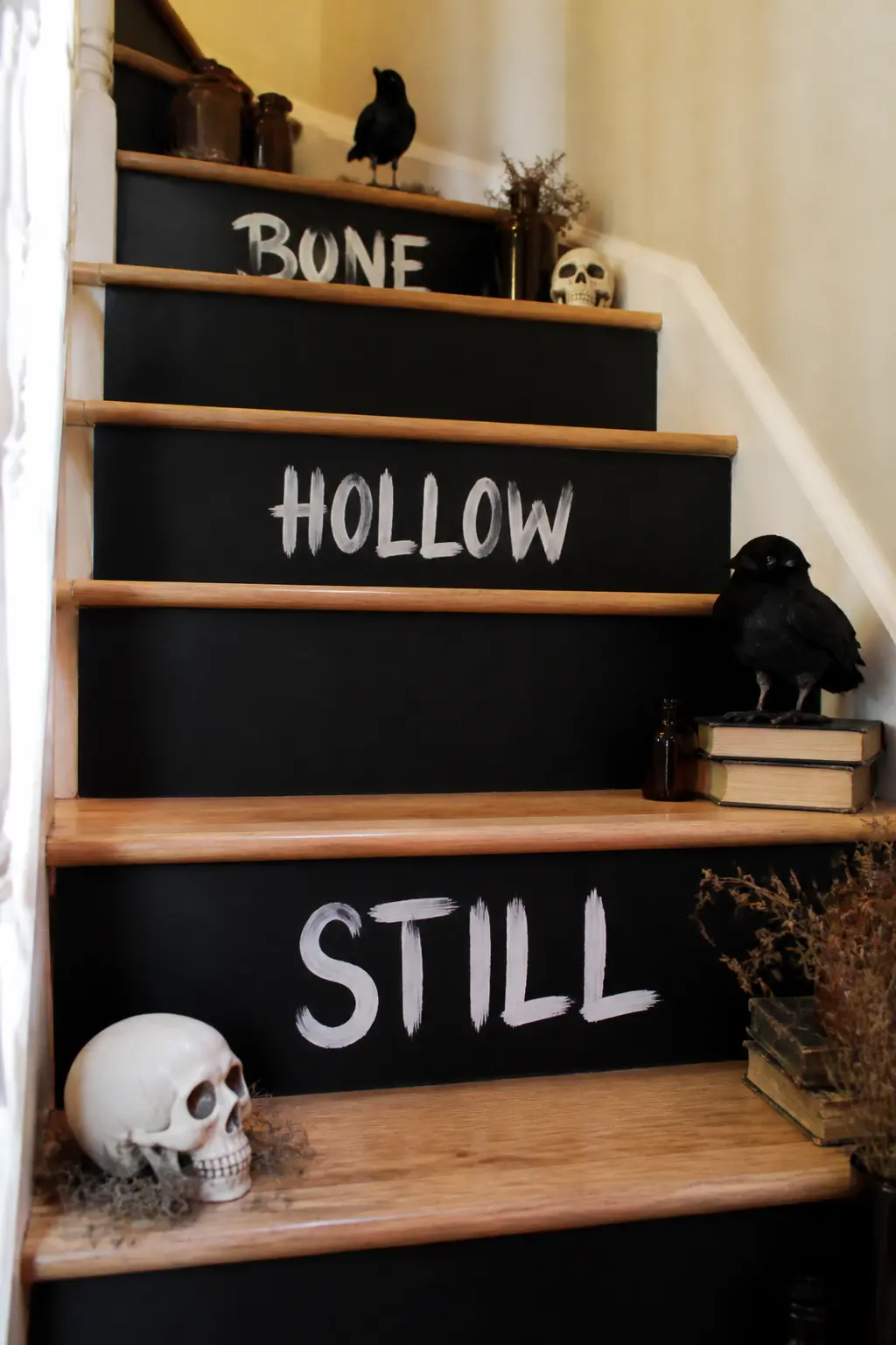 Chalk Paint Riser Typography — Paint the risers with chalk paint in matte black and letter each one with a single word in white: 'Bone', 'Night', 'Hollow'