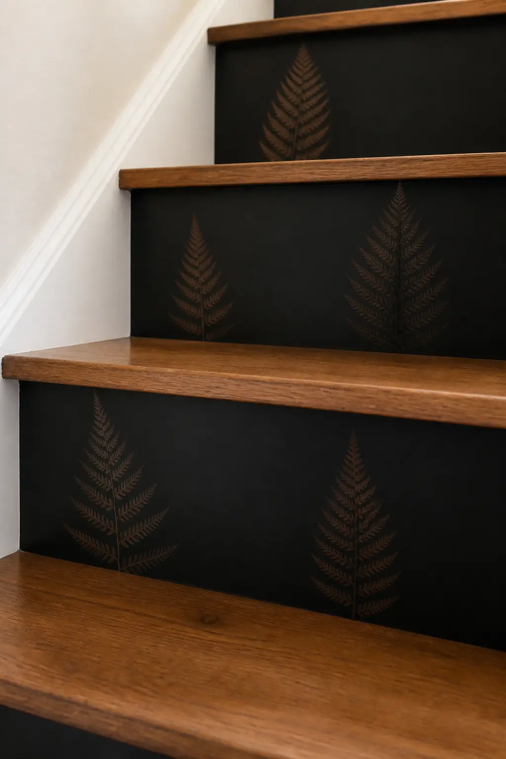 Pressed Fern Riser Panels — Press fern fronds between books for a week, then mount each one on black paper cut to riser dimensions and adhere the panel to the