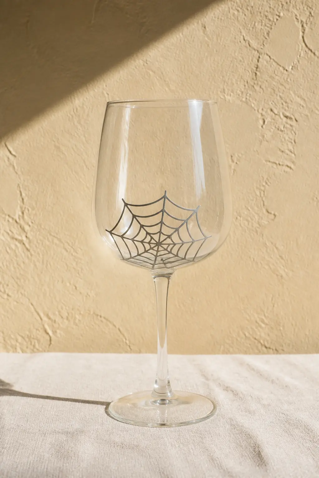 Water-Slide Decal Spiderweb — Print a spiderweb design onto water-slide decal paper on a home inkjet printer, seal it with a decal spray, soak it for 30