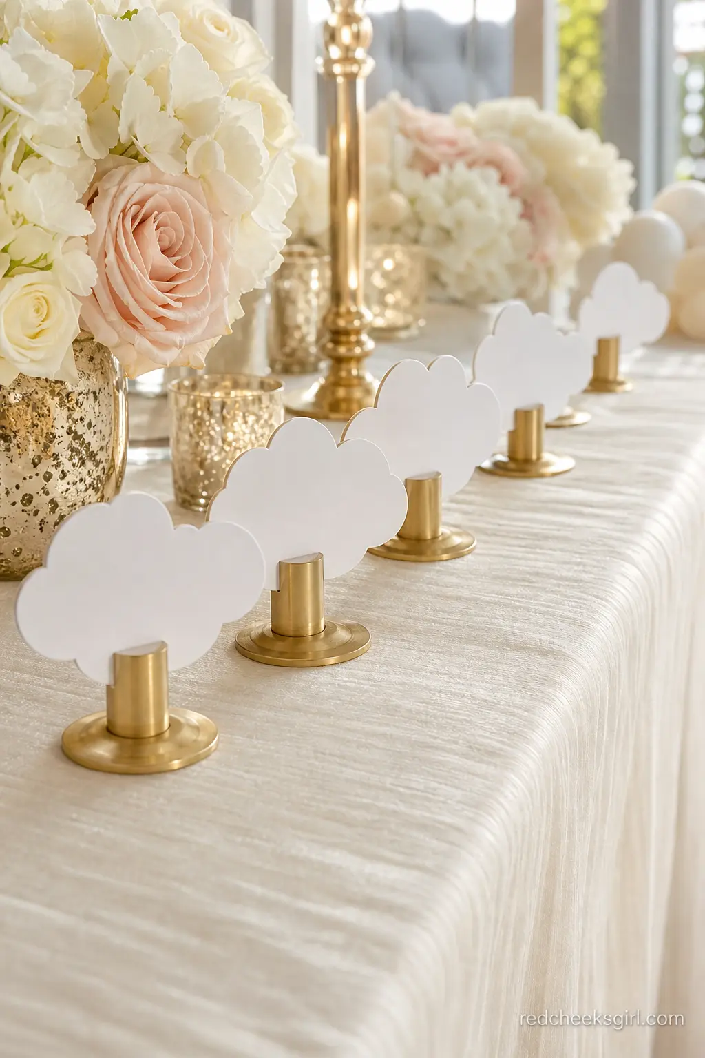 Cloud Shaped Place Card Stands — Small brushed gold stands, each holding a blank cloud shaped card, mark seats without a single loud element on the table.