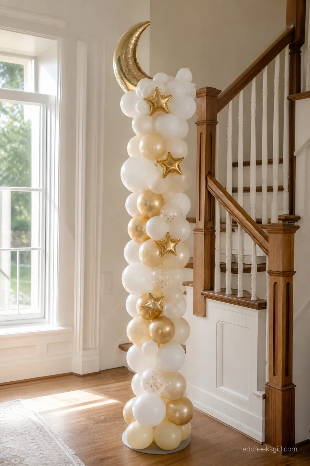 A Slim Balloon Column by the Staircase — A single narrow balloon column, tucked beside a staircase or doorway rather than centered in a room, does more with
