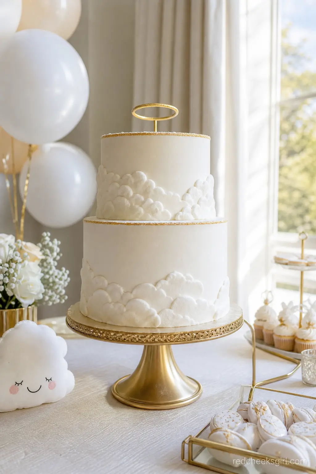 A Two Tier Cloud Painted Cake — A mostly white cake with soft cloud texture piped around the base and a little gold edging near the top needs almost no