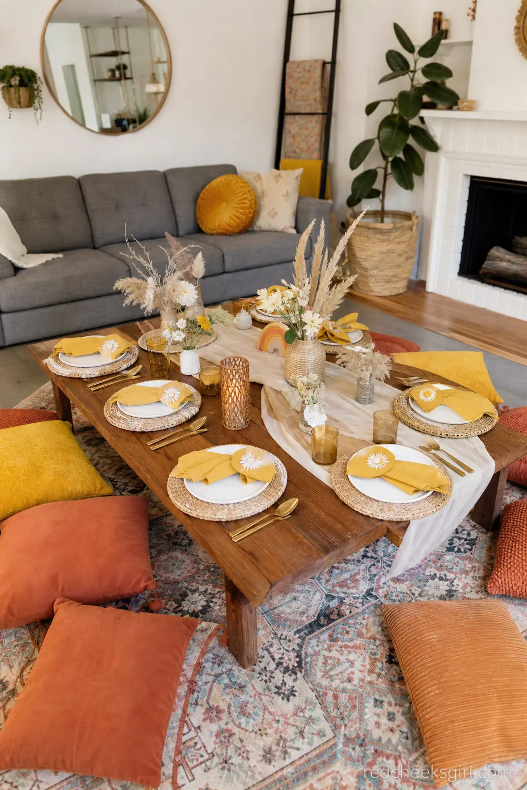 Boho Low Picnic Table — Swap the dining table for a low wooden table surrounded by floor cushions in terracotta and mustard. Here comes the sun baby shower