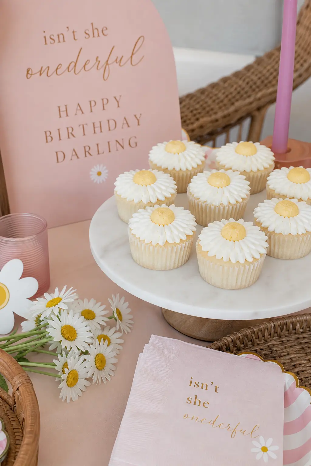 Butter Yellow Centered Daisy Cupcakes — A simple ring of white frosting petals with one dot of butter yellow at the center takes less piping skill than it