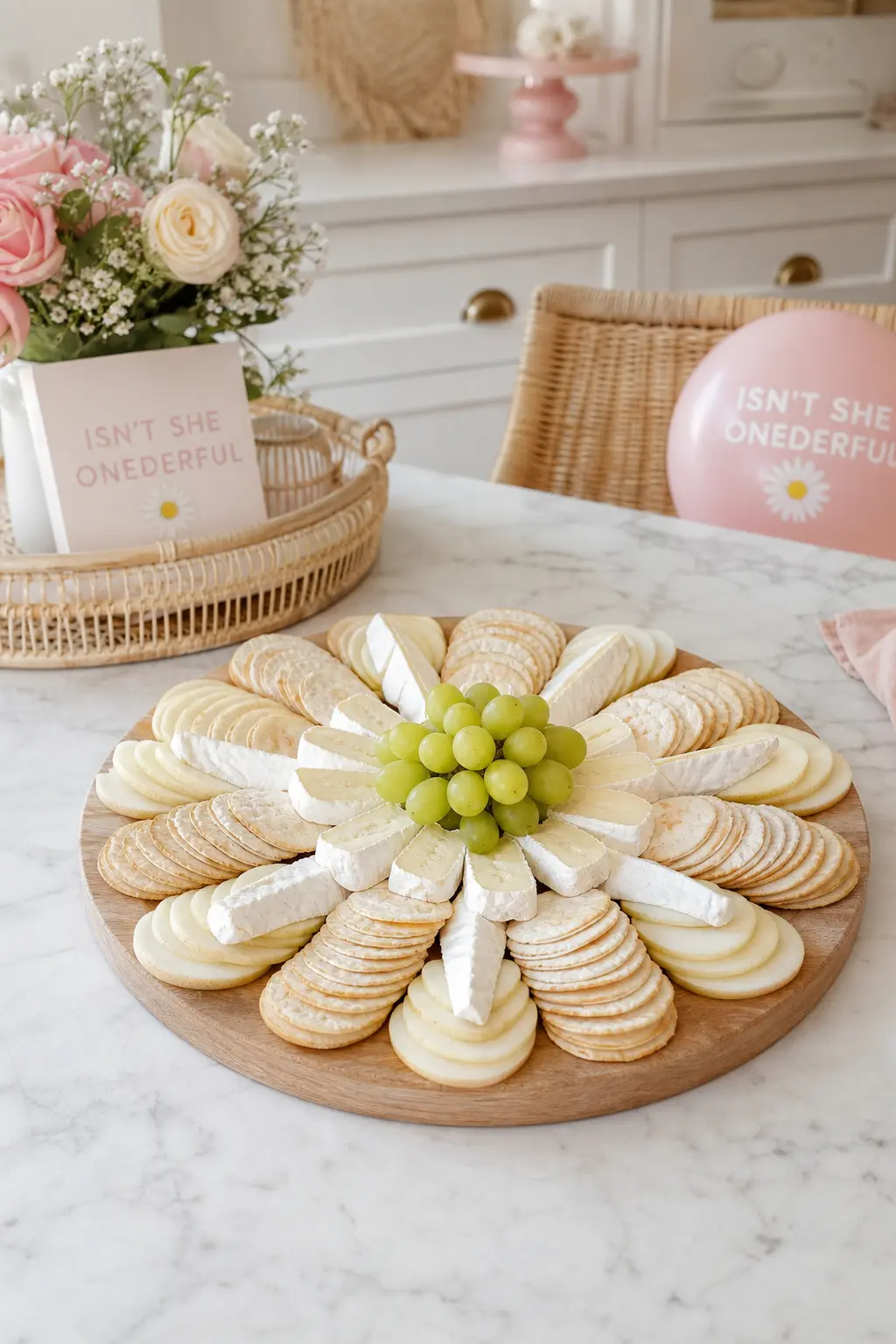 Daisy Shaped Fruit and Cheese Board — Adult guests need something on the table too, and a daisy shaped board of soft cheese, crackers and pale fruit keeps the