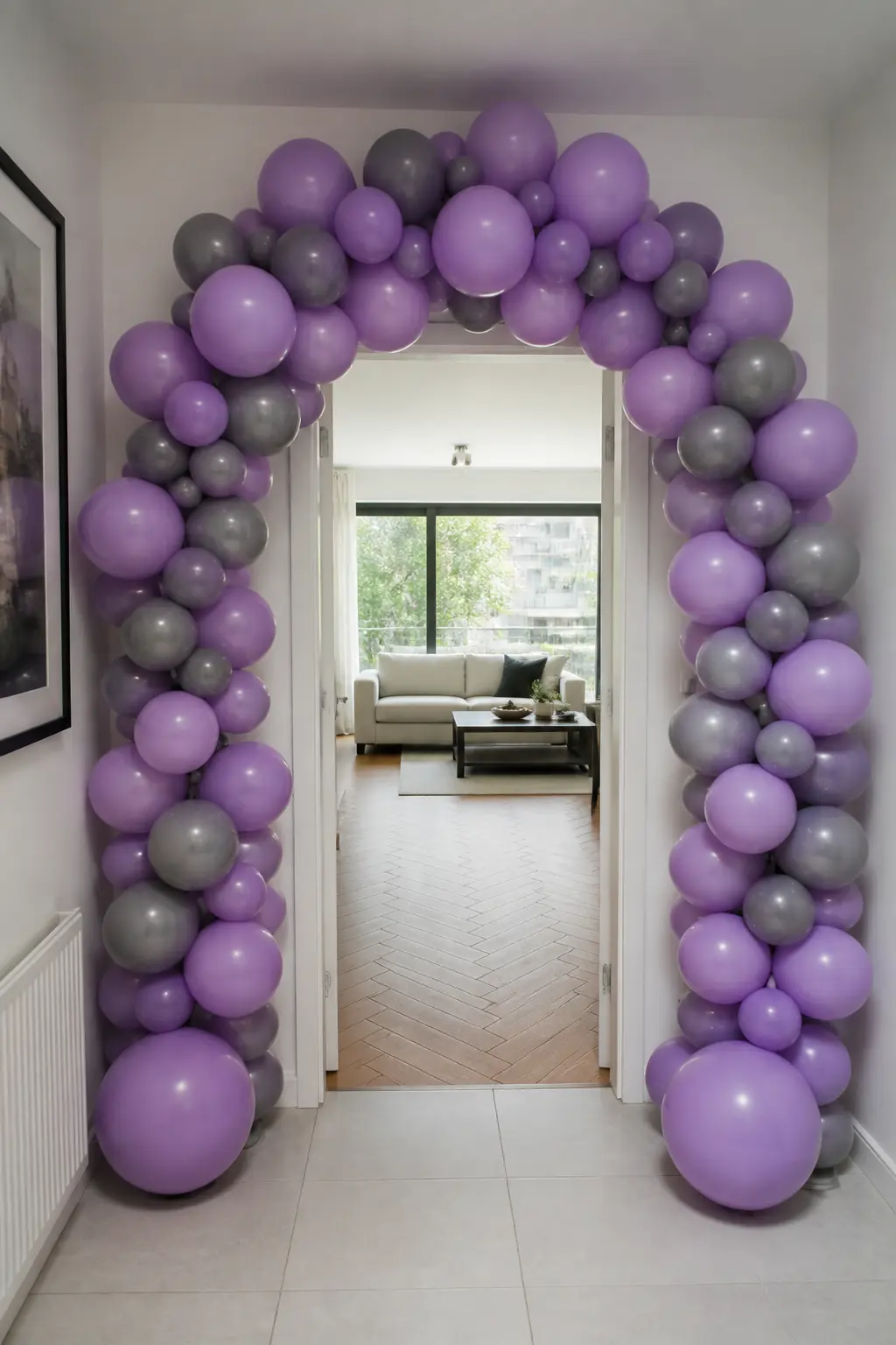 Lavender and Grey Arch Over a Modern Flat's Doorway for a Thirtieth — Grey is the pairing colour that most reliably moves lavender out of the pastel register
