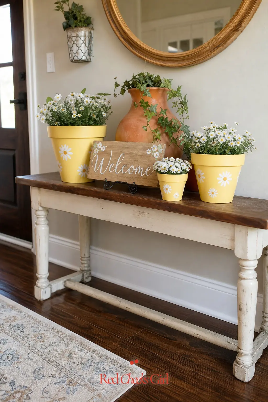 Painted Flower Pot Sign Display — A cluster of terracotta pots painted in a warm yellow does the job of a welcome sign without needing a sign shop. Love is in