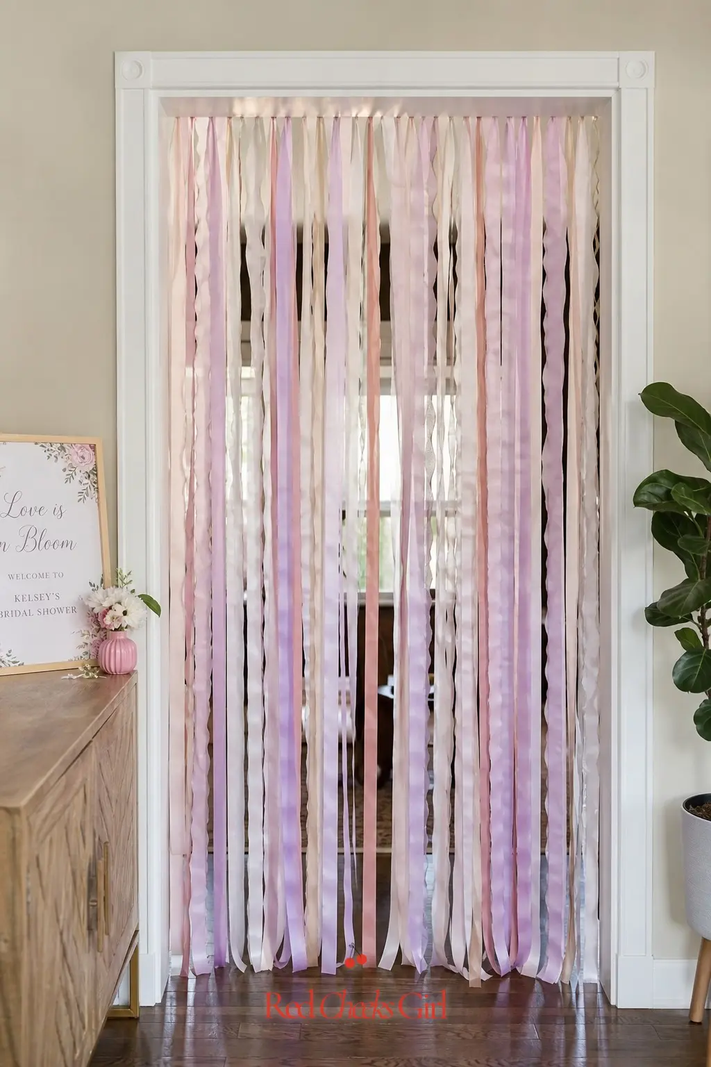 Pastel Ribbon Streamer Doorway — Instead of flowers at the door, hang loose ribbon the full height of the frame in lavender and dusty rose. Love is in bloom