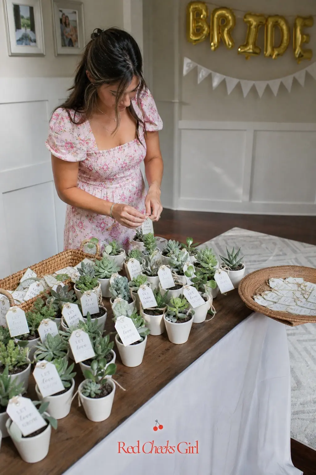 Potted Succulent Favor Station — Small white pots of succulents lined up with a name tag tucked into each one give guests a living favor that needs almost no