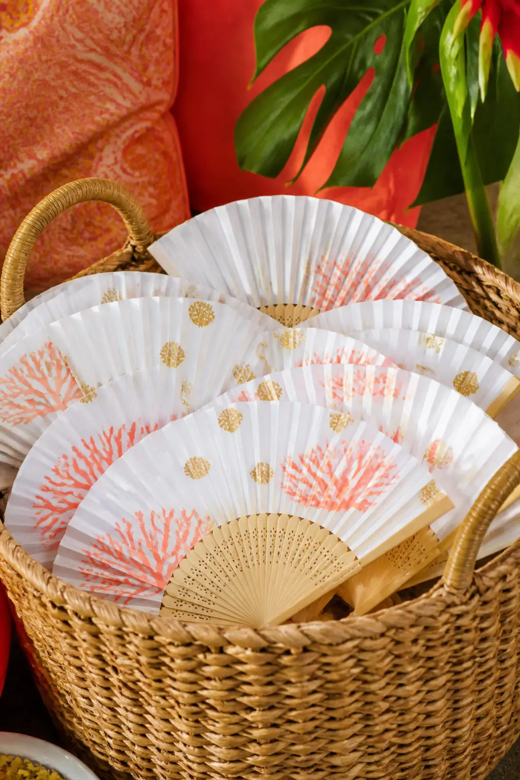 Hand-Painted Fan Favours — Stack a basket of foldable paper or fabric hand fans at the exit, each one painted or stamped with a small motif in the party