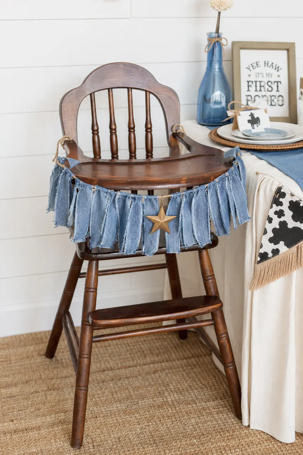 High Chair Banner and Place Setting — The birthday boy's own seat gets a fringe banner in denim chambray strung across the high chair tray, with a single brass