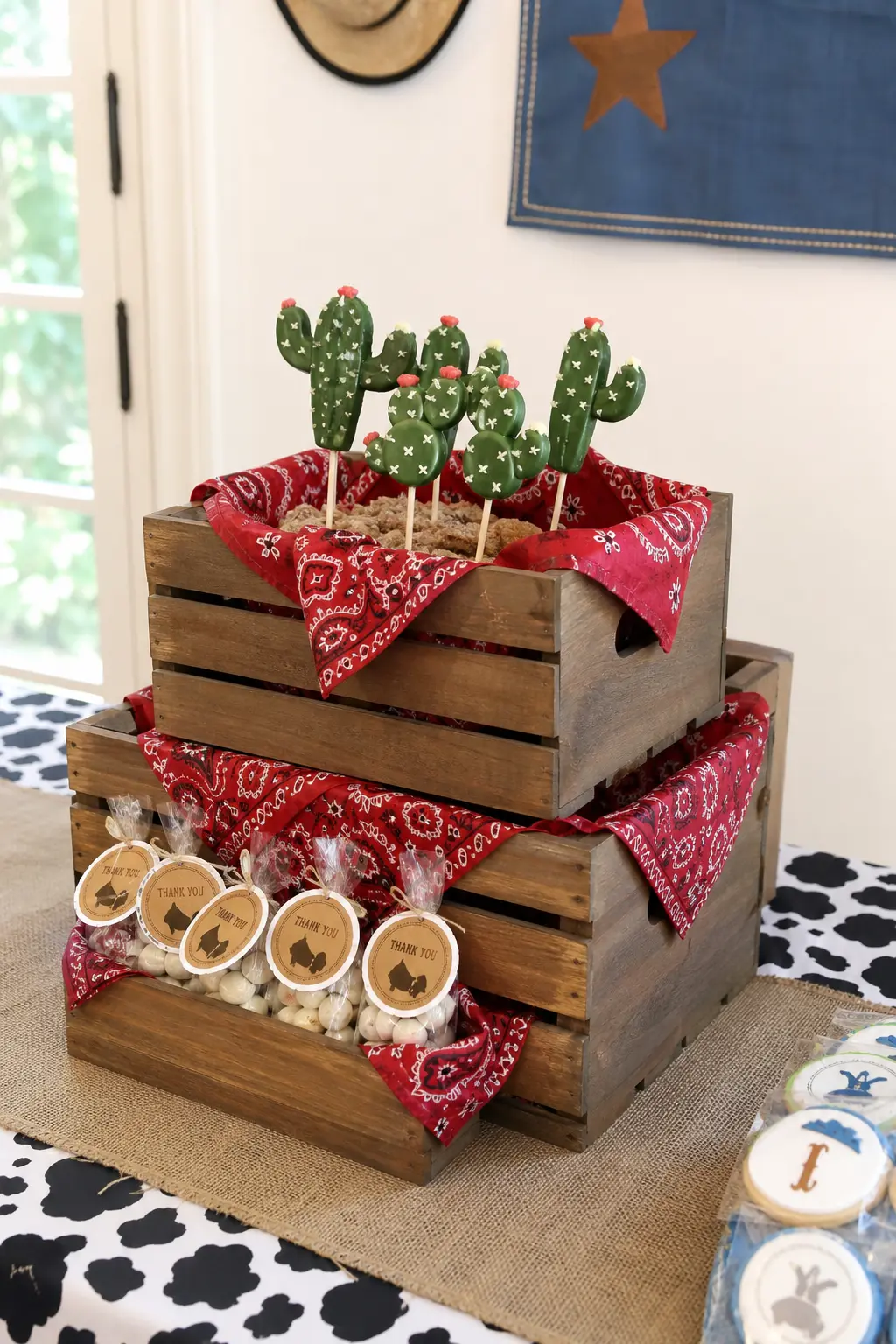 Wooden Crate Tiered Stand With Bandana Lining — Two stacked wooden crates of different sizes, each lined with a folded red bandana, create instant height
